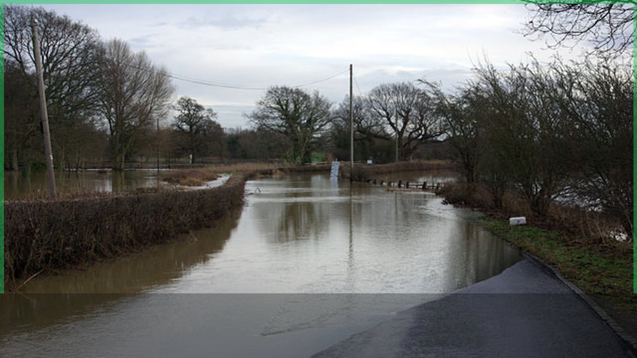 Road closed sign after bad weather and flooding