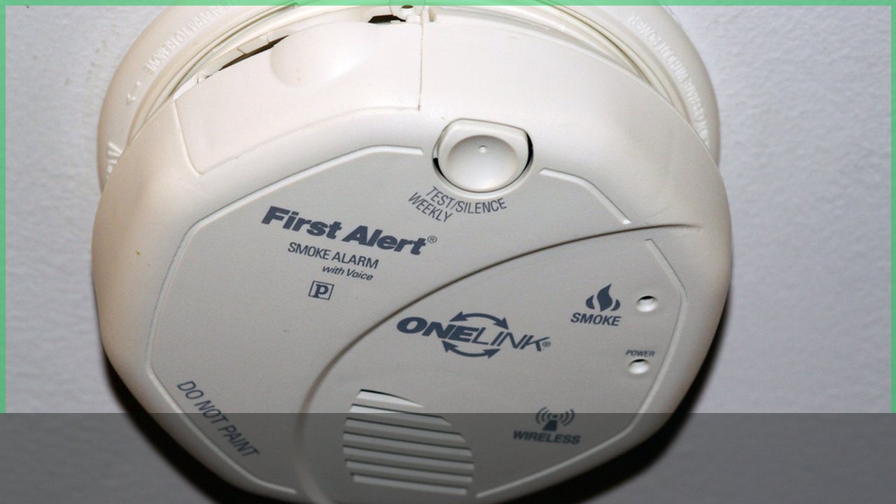 Smoke alarm installed on a ceiling for home fire safety
