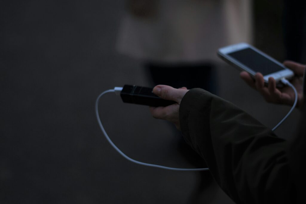 Phone charging from a portable power bank during an outage